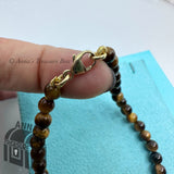 Tiffany & Co. 18K Yellow Gold 4mm Tiger Eye Mini RTT Round 7" Bracelet (Boxset)