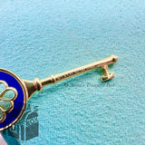 Tiffany & Co. 18K Yellow Gold Navy Enamel Knot 1.75" Key Charm (box, pch, rbbn)