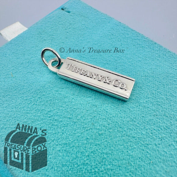 Tiffany & Co. 925 Silver Logo Rectangle Pendant Love Bar Charm (pouch)