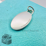 Return To Tiffany & Co. Medium Black Splash Oval Charm (pouch)