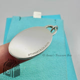 Return To Tiffany & Co. Medium Black Splash Oval Charm (pouch)