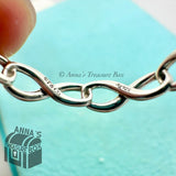 Tiffany & Co. 925 Silver Multi Infinity Narrow Ring Band Sz. 7 (pouch)