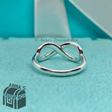 Tiffany & Co. 925 Silver Infinity Ring Sz. 4.5 (pouch)