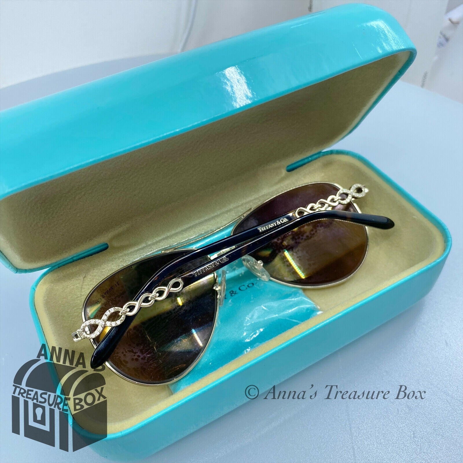 Tiffany HardWear Sunglasses in Pale Gold-colored Metal with Blue Lenses |  Tiffany & Co.