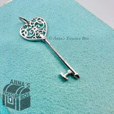Tiffany & Co. 18K White Gold with Diamond Enchant Key Charm (box, pouch, ribbon)